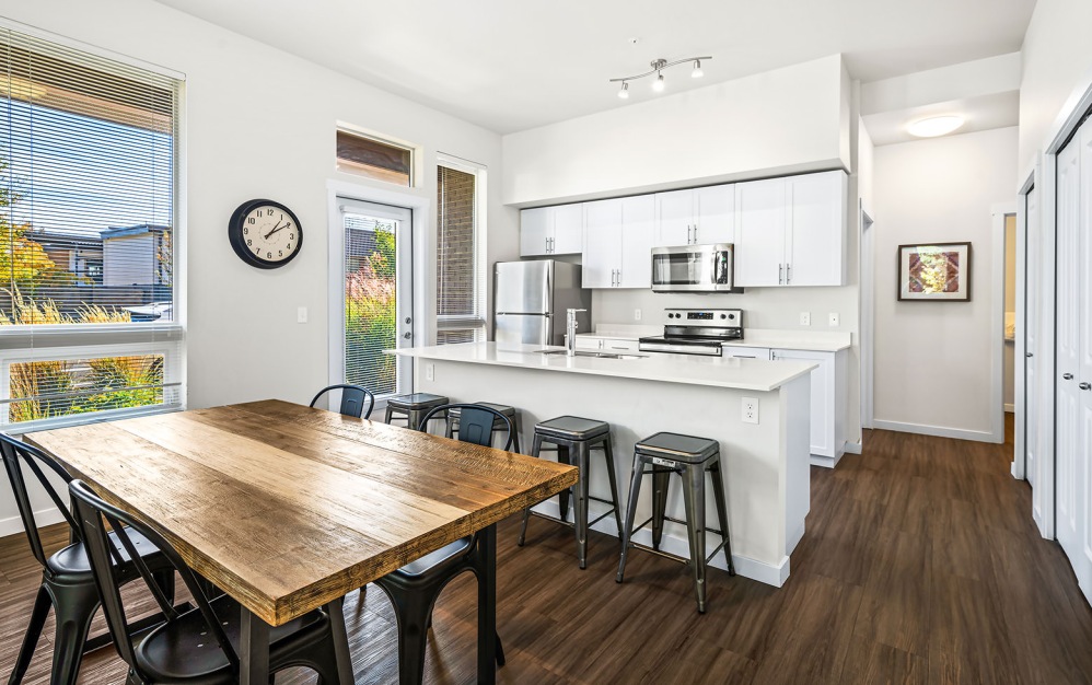 spacious dining area next to kitchen